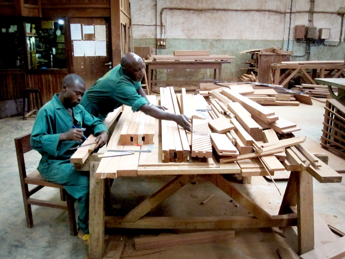 Men working in a timber workshop of ENRA, a timber company in Beni, Eastern DRC. Photo © Mari-Lise Du Preez/ SAIIA